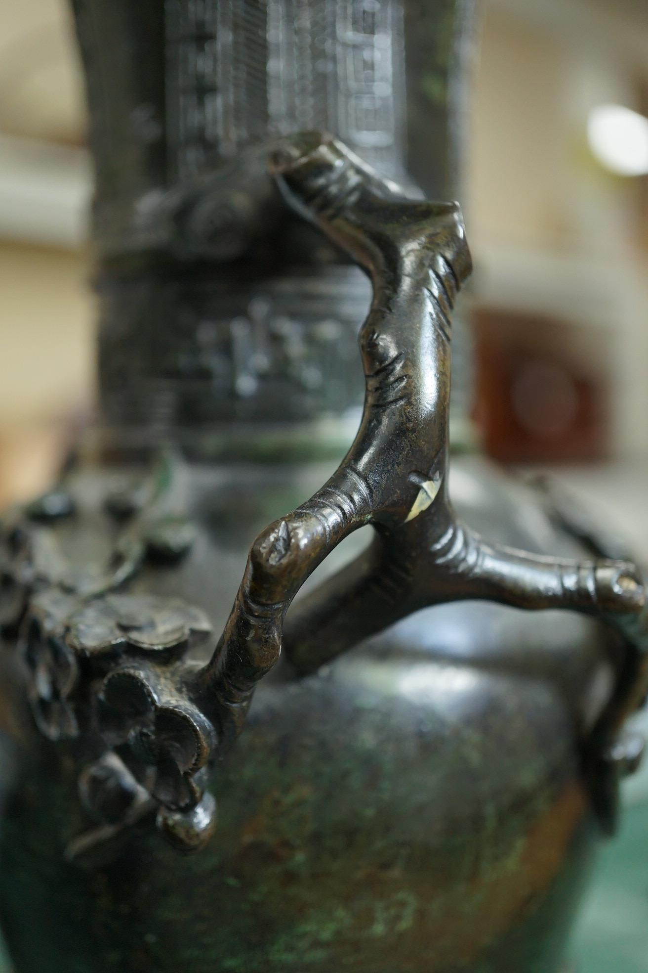 A pair of Chinese bronze gu-shaped vases, Qing dynasty